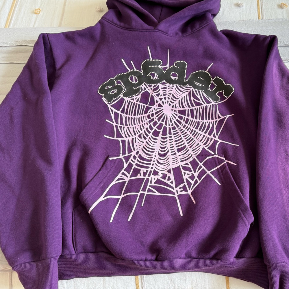 Sp5der purple sweatshirt.